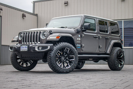 2021 Jeep Wrangler Unlimited Sahara 4XE with a 6" Rough Country lift kit, 22x12 Fuel Rebar wheels, and 35" Fury Country Hunter R/T tires.