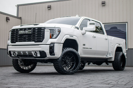 2024 GMC Sierra 2500 Denali with a 3" Cognito leveling kit, 24x14 American Force Frost wheels, and 33" Fury Country Hunter M/T tires.