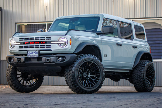 2023 Ford Bronco Heritage Limited Edition with a 2.5" Rough Country lift kit, 22x12 TIS 566B wheels, and 35" TIS Offroad Hercules tires.