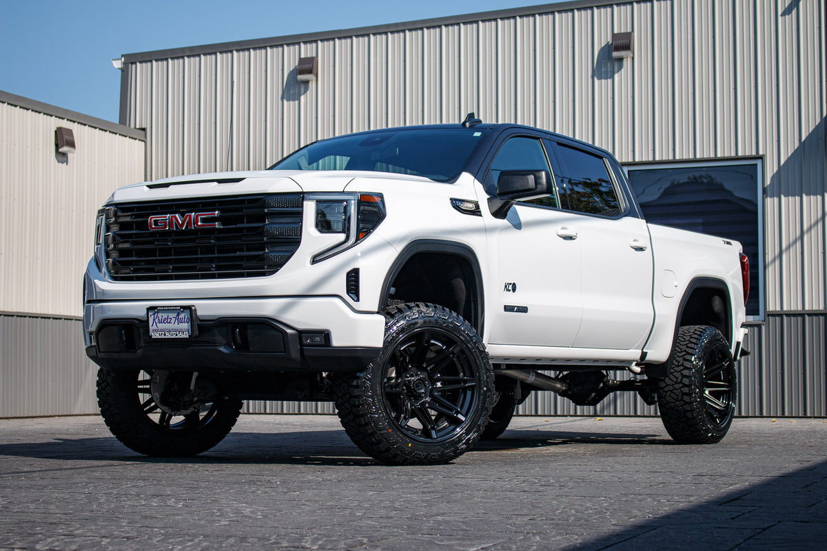 2024 GMC Sierra 1500 Elevation with a 6" Rough Country lift kit, 22x12 Fuel Brawl wheels, and 35" Fury Country Hunter R/T tires.