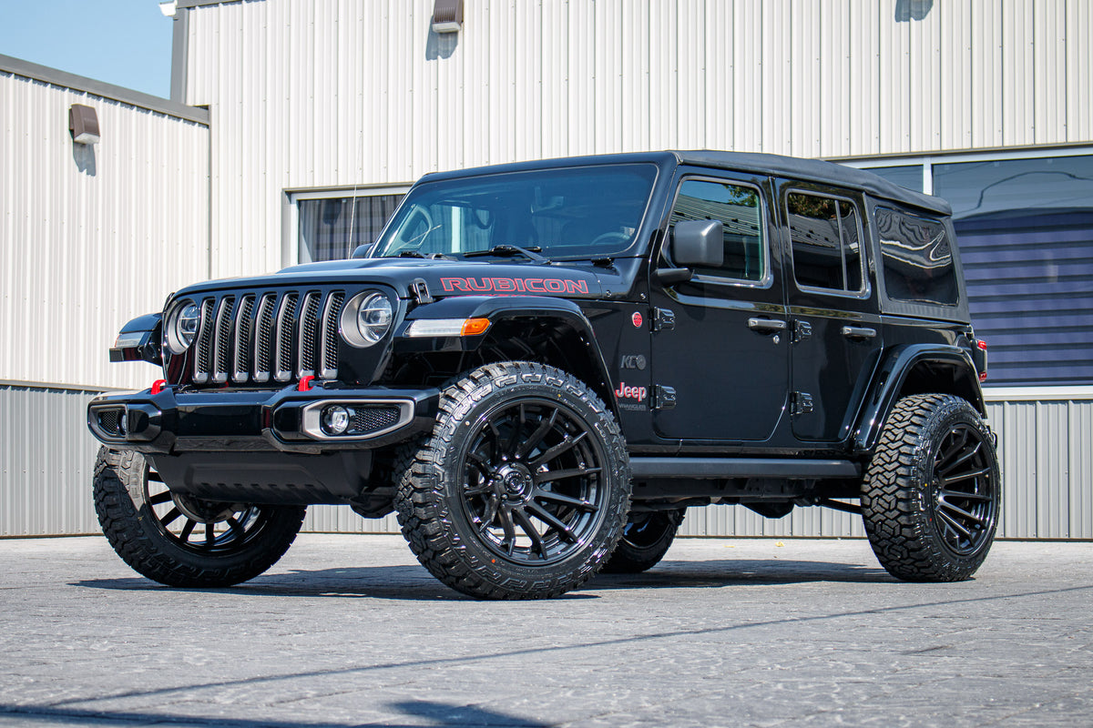 2022 Jeep Wrangler with Jeep Stock suspension, 22x12 Fuel Flux wheels, and 35" Fury Country Hunter R/T tires.