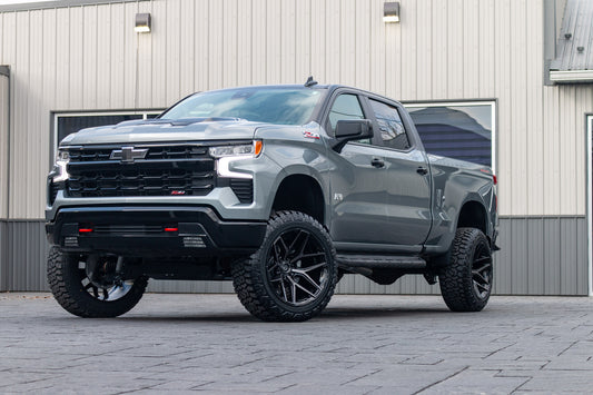 2024 Chevrolet Silverado 1500 LT Trail Boss with a 6" Rough Country lift kit, 22x12 Fuel Flux wheels, and 35" Fury Country Hunter R/T tires.