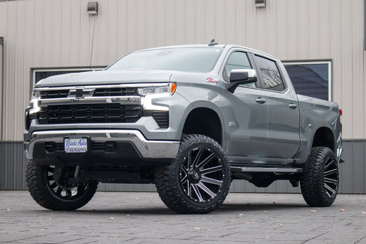 2023 Chevrolet Silverado 1500 LT with a 6" Rough Country lift kit, 22x12 Fuel Contra wheels, and 35" Fury Country Hunter R/T tires.
