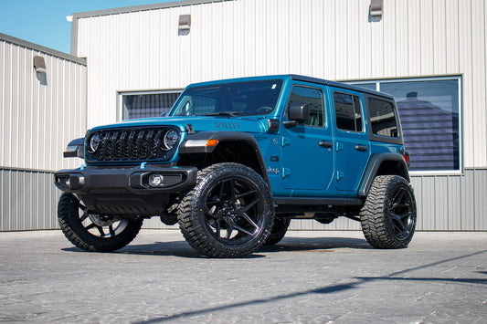 2024 Jeep Wrangler Willys 4XE with a 2.5" Rough Country lift kit, 22x12 Fuel Flux wheels, and 35" Avix Trailtek R/T tires.
