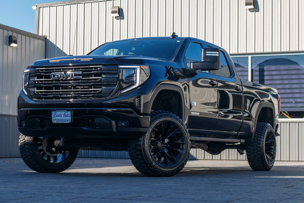 2024 GMC Sierra 1500 Elevation with a 6" Rough Country lift kit, 22x12 Fuel Flame wheels, and 35" Fury Country Hunter R/T tires.