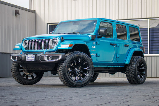 2024 Jeep Wrangler Sahara 4XE with a 2.5" Rough Country lift kit, 22x12 Fuel Flame wheels, and 35" Fury Country Hunter R/T tires.