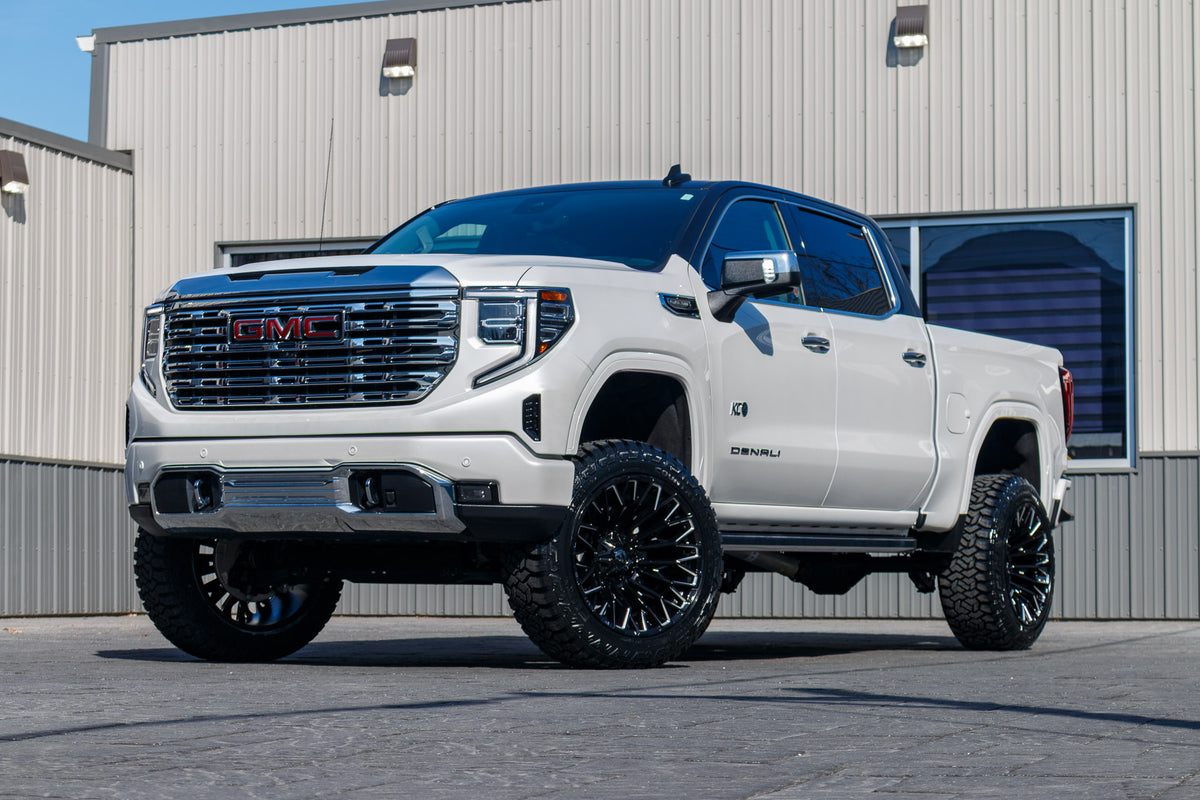 2024 GMC Sierra 1500 Denali with a 6" Rough Country lift kit, 22x12 Fuel Strike wheels, and 35" Fury Country Hunter R/T tires.