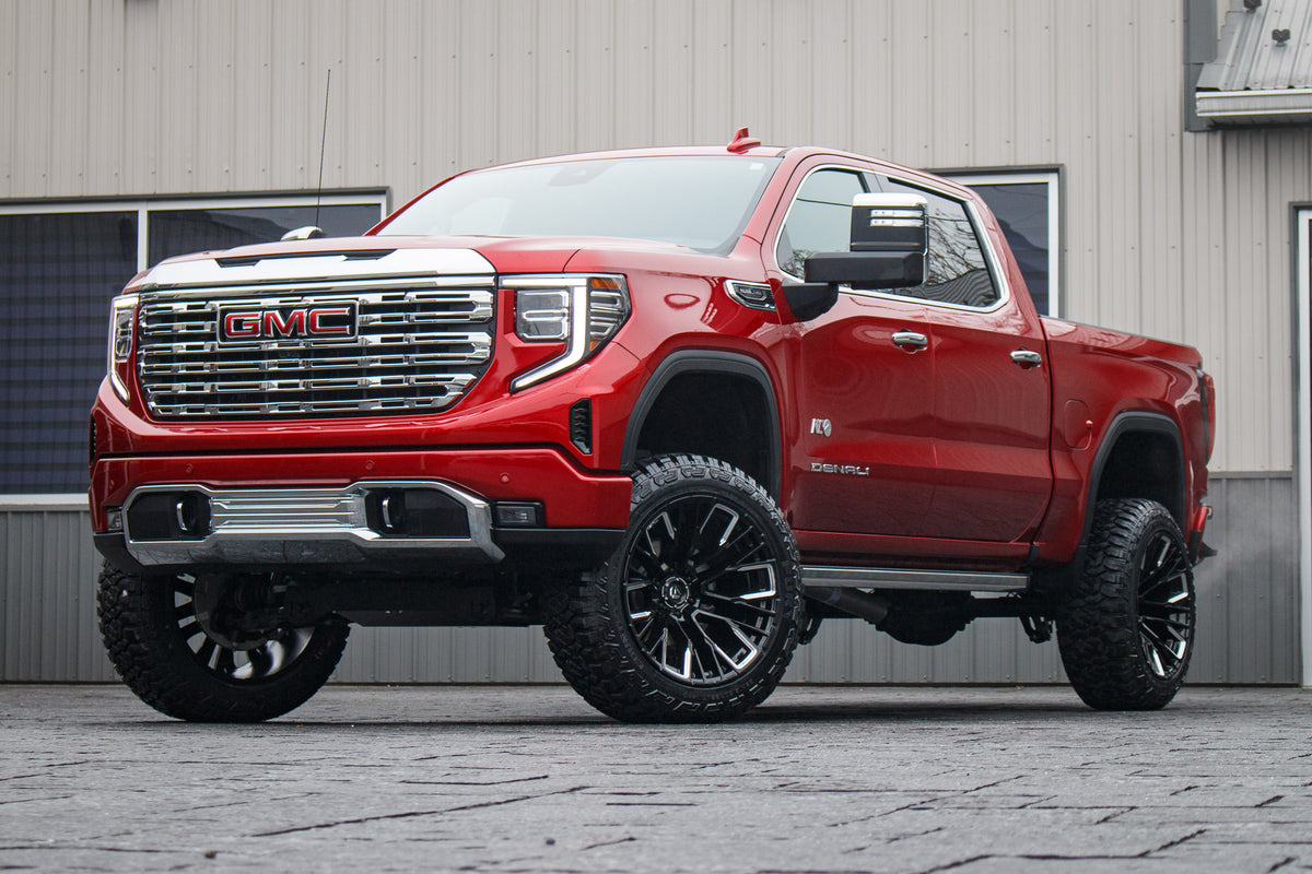 2024 GMC Sierra 1500 Denali with a 6" Rough Country lift kit, 22x12 Fuel Rebar wheels, and 35" Fury Country Hunter R/T tires.