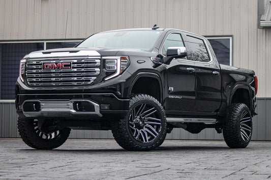 2024 GMC Sierra 1500 Denali with a 6" Rough Country suspension kit, 22x12 Fuel Typhoon wheels, and 35" Fury Country Hunter R/T tires.