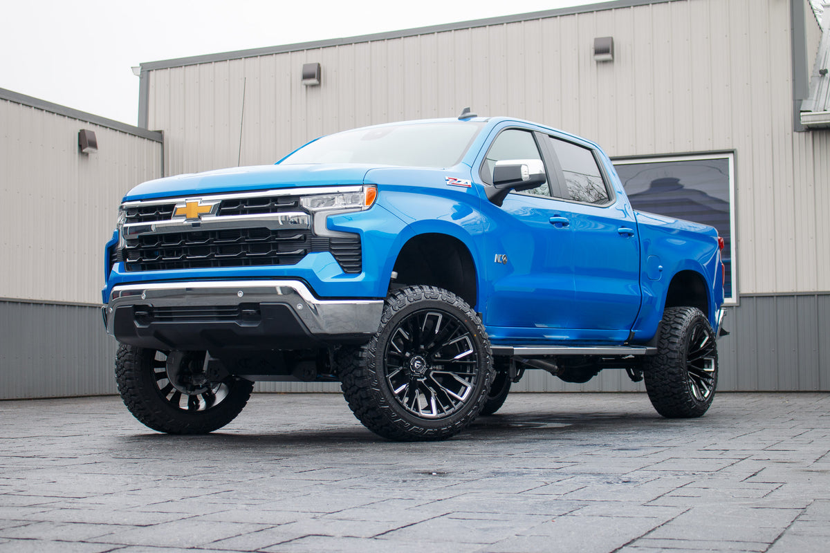 2026 Chevrolet Silverado 1500 LT with a 6" Rough Country lift kit, 22x12 Fuel Rebar wheels, and 35" Fury Country Hunter R/T tires.