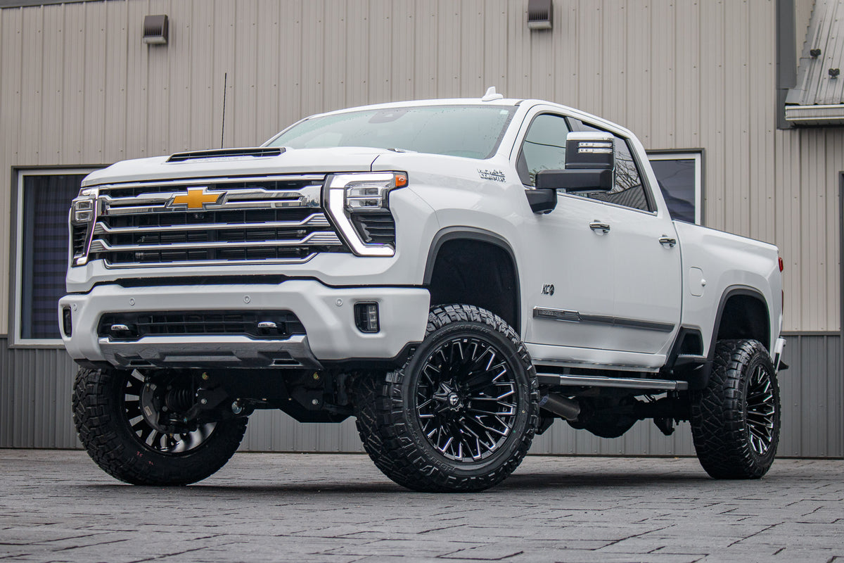 2024 Chevrolet Silverado 3500 High Country with a 5" BDS lift kit, 22x12 Fuel Strike wheels, and 37" Nitto Ridge Grappler tires.