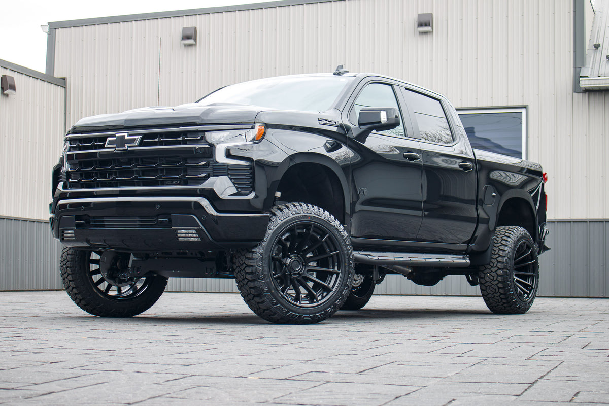 2024 Chevrolet Silverado 1500 LT Trail Boss with a 6" Rough Country lift kit, 22x12 Fuel Burn wheels, and 35" Fury Country Hunter R/T tires.