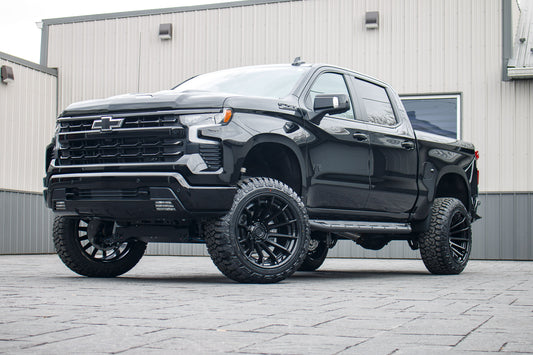2024 Chevrolet Silverado 1500 LT Trail Boss with a 6" Rough Country lift kit, 22x12 Fuel Burn wheels, and 35" Fury Country Hunter R/T tires.