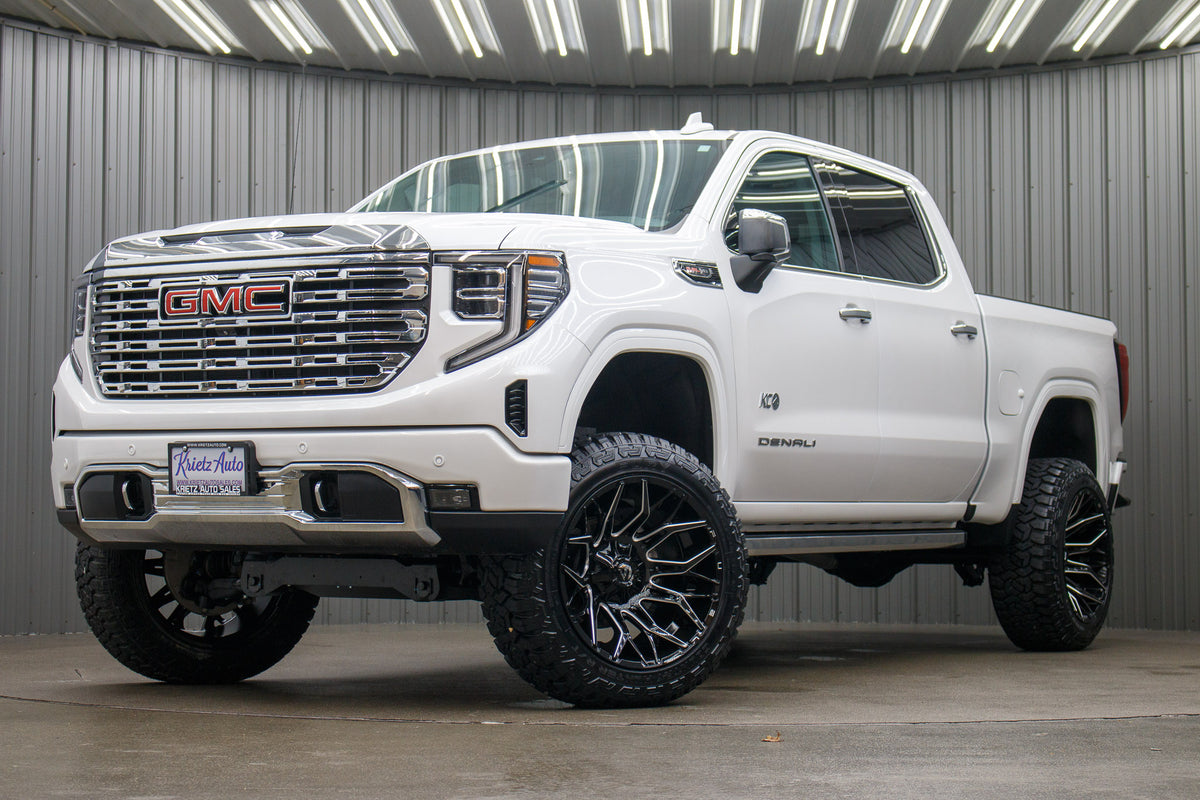 2023 GMC Sierra 1500 Denali with a 6" Rough Country suspension kit, 22x12 Fuel Twitch wheels, and 35" Fury Country Hunter R/T tires.
