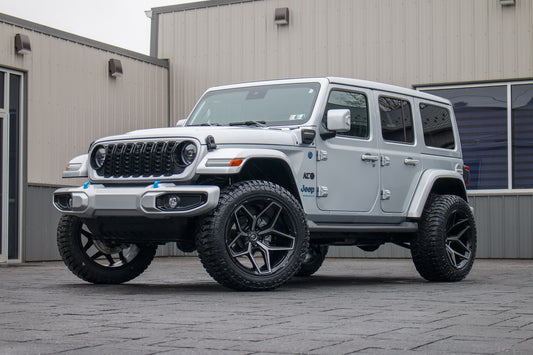 2024 Jeep Wrangler High Altitude 4XE with a 2.5" Rough Country lift kit, 22x12 Fuel Flux wheels, and 35" Avix Trailtek R/T tires.