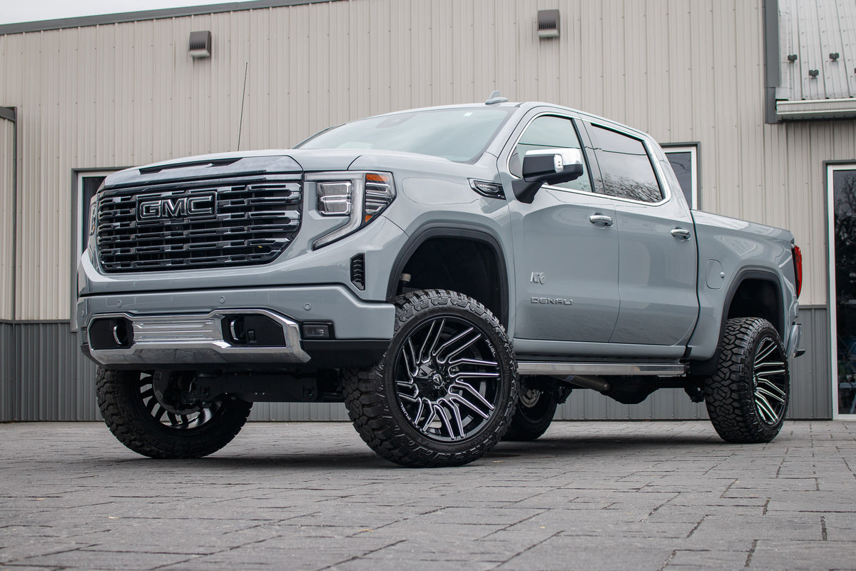 2024 GMC Sierra 1500 Denali Ultimate with a 6" Rough Country lift kit, 22x12 Fuel Typhoon wheels, and 35" Fury Country Hunter R/T tires.