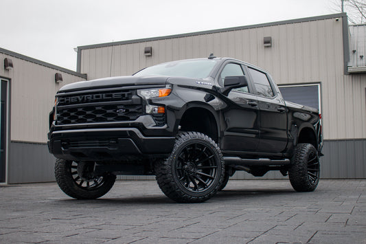 2025 Chevrolet Silverado 1500 Custom with a 6" Rough Country lift kit, 22x12 Fuel Burn wheels, and 35" Fury Country Hunter R/T tires.