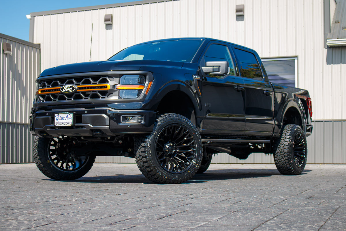 2024 Ford F-150 Tremor with a 6" Rough Country lift kit, 22x12 Fuel Strike wheels, and 35" Fury Country Hunter R/T tires.
