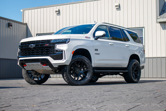 2023 Chevrolet Tahoe Z71 with a 3" ReadyLift lift kit, 22x10 Fuel Flux wheels, and 295/50 Toyo Open Country AT3 tires.
