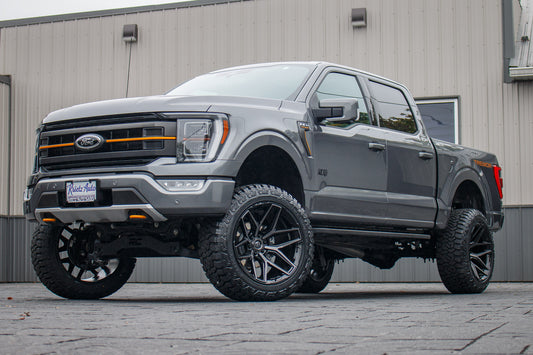 2023 Ford F-150 Tremor with a 6" Rough Country lift kit, 22x12 Fuel Flux wheels, and 35" Fury Country Hunter R/T tires.