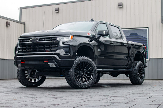 2025 Chevrolet Silverado 1500 with a 6" Rough Country lift kit, 22x12 Fuel Rebar wheels, and 35" Fury Country Hunter R/T tires.