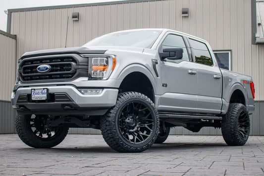 2022 Ford F-150 XLT with a 6" Rough Country lift kit, 22x12 Fuel Twitch wheels, and 35" Fury Country Hunter R/T tires.