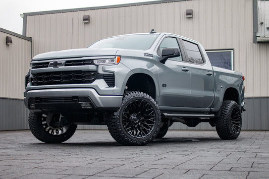 2024 Chevrolet Silverado 1500 RST with a 6" Rough Country lift kit, 22x12 Fuel Strike wheels, and 35" Fury Country Hunter R/T tires.