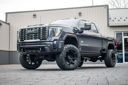 2024 GMC Sierra 2500 Denali Ultimate with a 5" BDS lift kit, 22x12 Fuel Brawl wheels, and 37" Nitto Ridge Grappler tires.