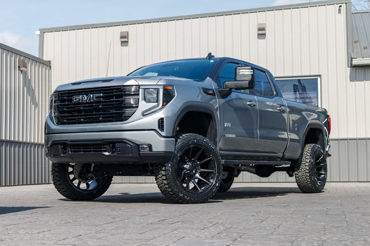2024 GMC Sierra 1500 Elevation with a 6" Rough Country lift kit, 22x12 Fuel Super C wheels, and 35" Fury Country Hunter R/T tires.