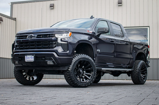 2024 GMC Sierra 1500 Denali with a 6" Rough Country lift kit, 22x12 Fuel Strike wheels, and 35" Fury Country Hunter R/T tires.