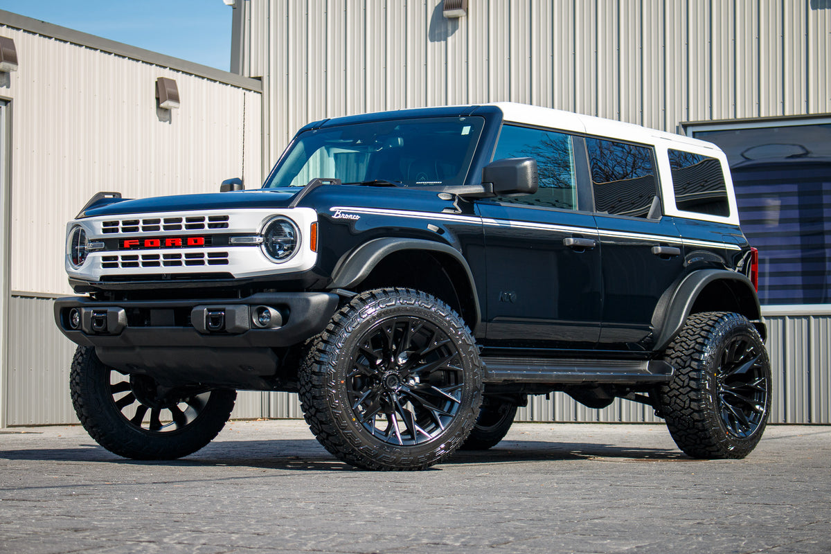 2025 Ford Bronco Heritage Edition with a 2.5" Rough Country lift kit, 22x12 Fuel Flame wheels, and 35" Fury Country Hunter R/T tires.