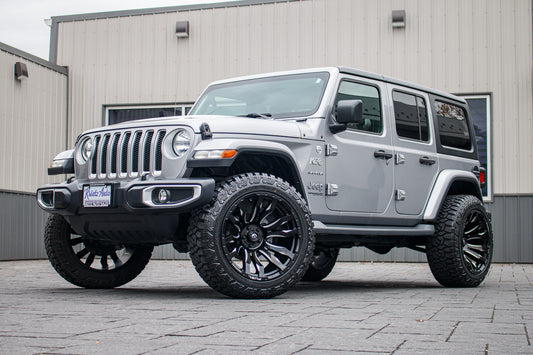 2020 Jeep Wrangler Unlimited Sahara with a 2.5" Rough Country lift kit, 22x12 Fuel Blitz wheels, and 35" Fury Country Hunter R/T tires.
