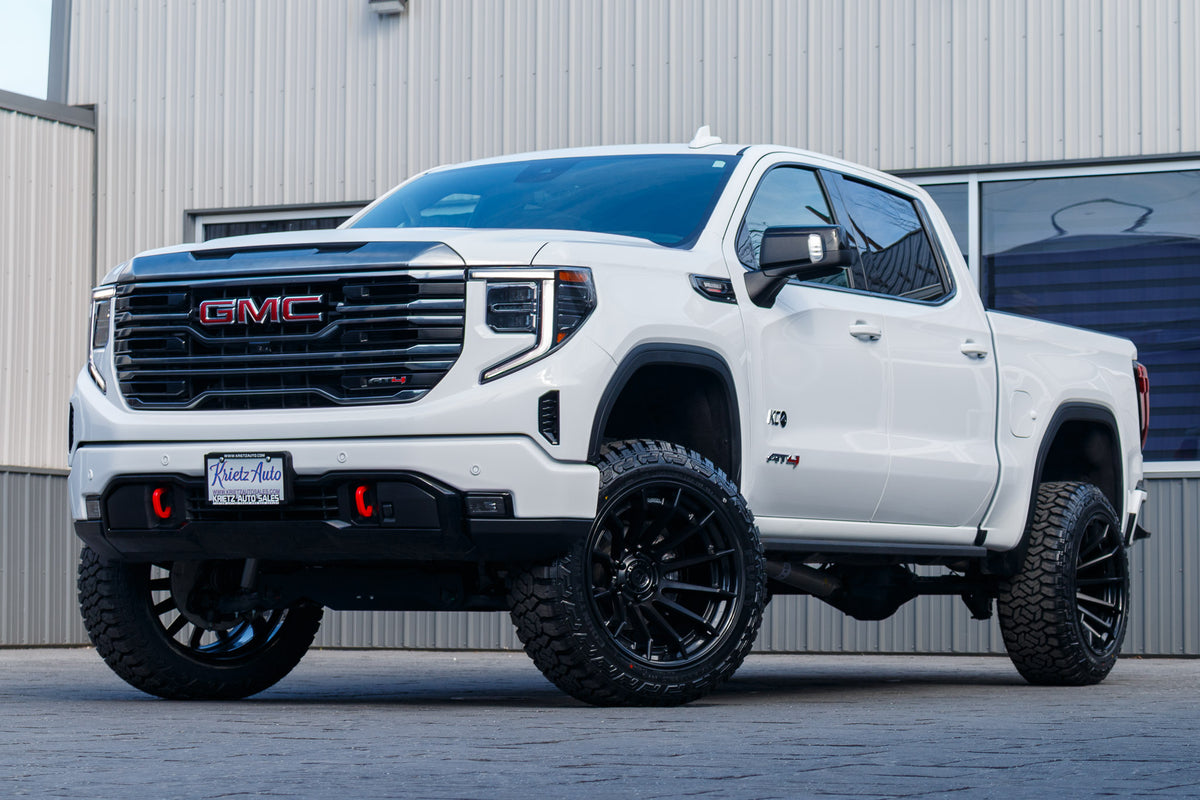 2024 GMC Sierra 1500 AT4 with a 6" Rough Country lift kit, 22x12 Fuel Burn wheels, and 35" Fury Country Hunter R/T tires.