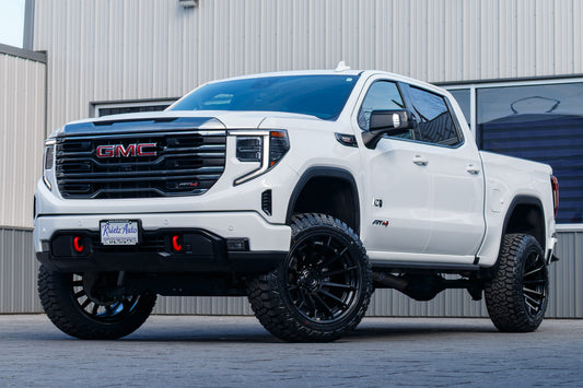 2024 GMC Sierra 1500 AT4 with a 6" Rough Country lift kit, 22x12 Fuel Burn wheels, and 35" Fury Country Hunter R/T tires.