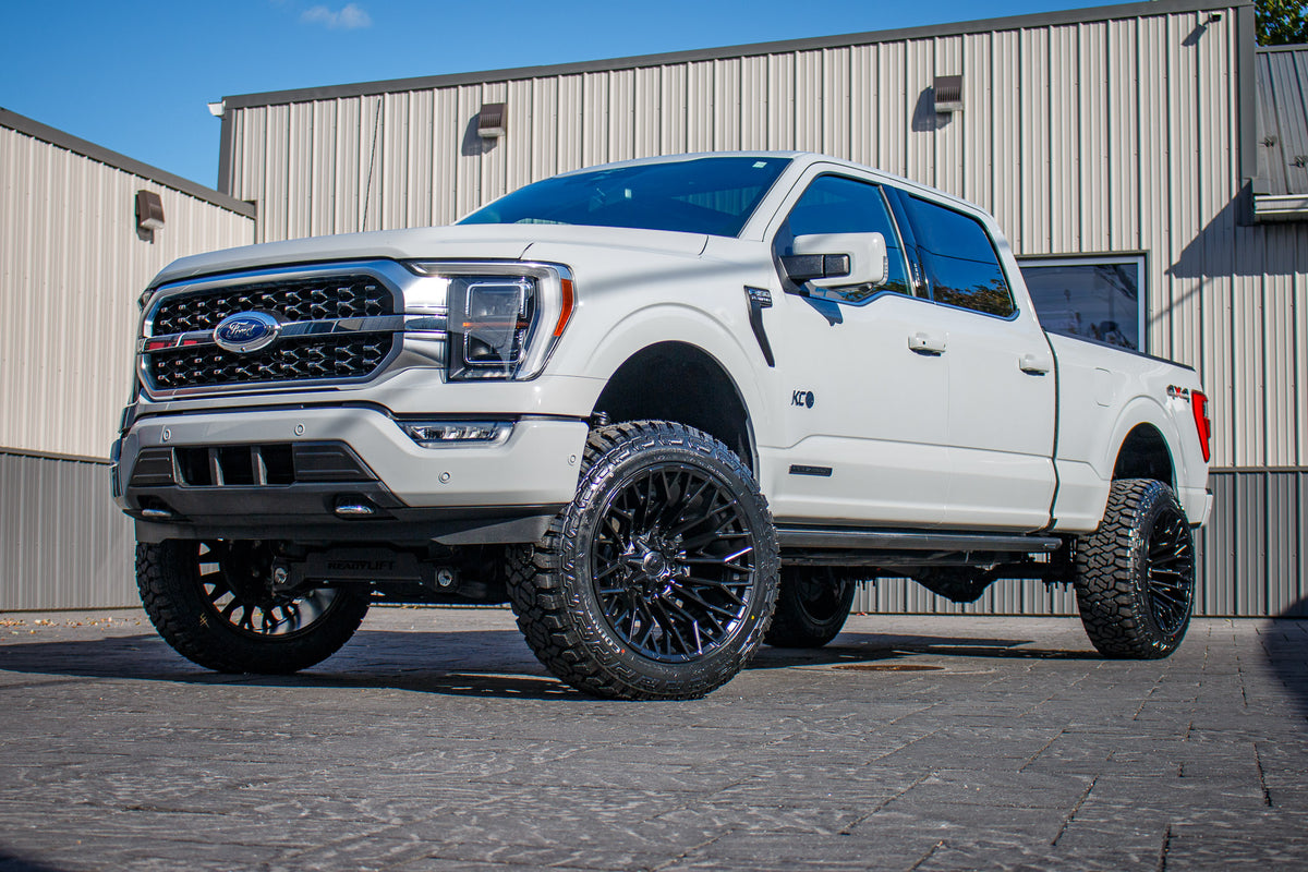 2023 Ford F-150 Tremor with a 6" Rough Country lift kit, 22x12 Fuel Flame wheels, and 35" Fury Country Hunter R/T tires.