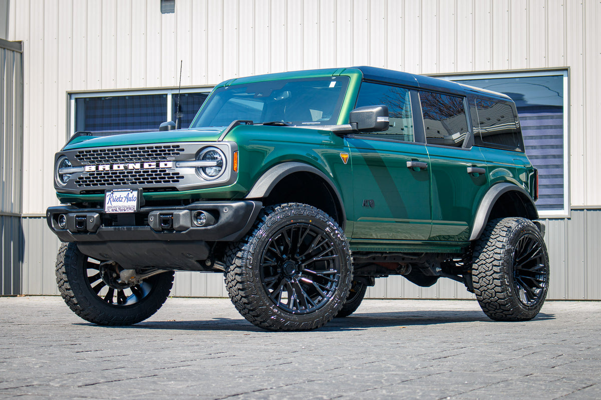 2025 Ford Bronco Badlands with a 3.5" Rough Country lift kit, 22x12 Fuel Rebar wheels, and 35" Fury Country Hunter R/T tires.