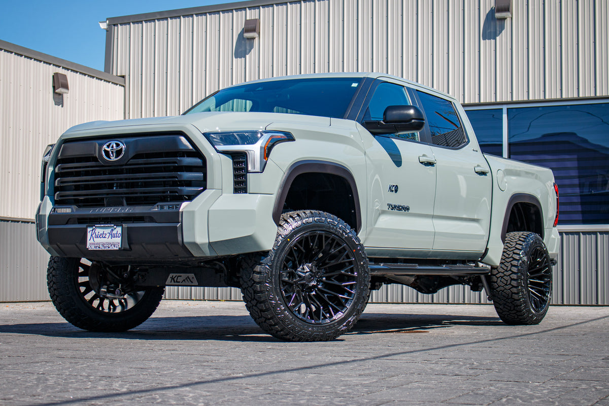 2024 Toyota Tundra SR with a 6" Rough Country lift kit, 22x12 Fuel Strike wheels, and 35" Fury Country Hunter R/T tires.