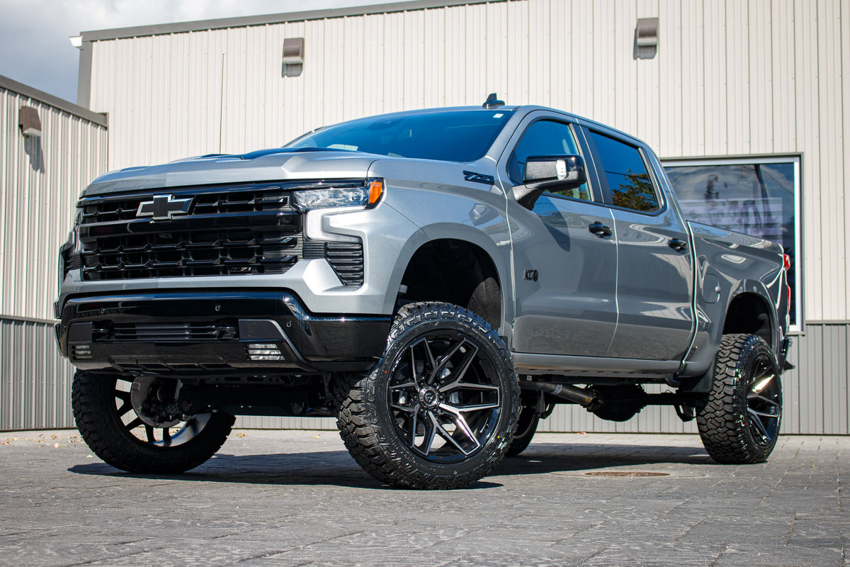 2024 Chevrolet Silverado 1500 LT Trail Boss with a 6" Rough Country lift kit, 22x12 Fuel Flux wheels, and 35" Fury Country Hunter R/T tires.