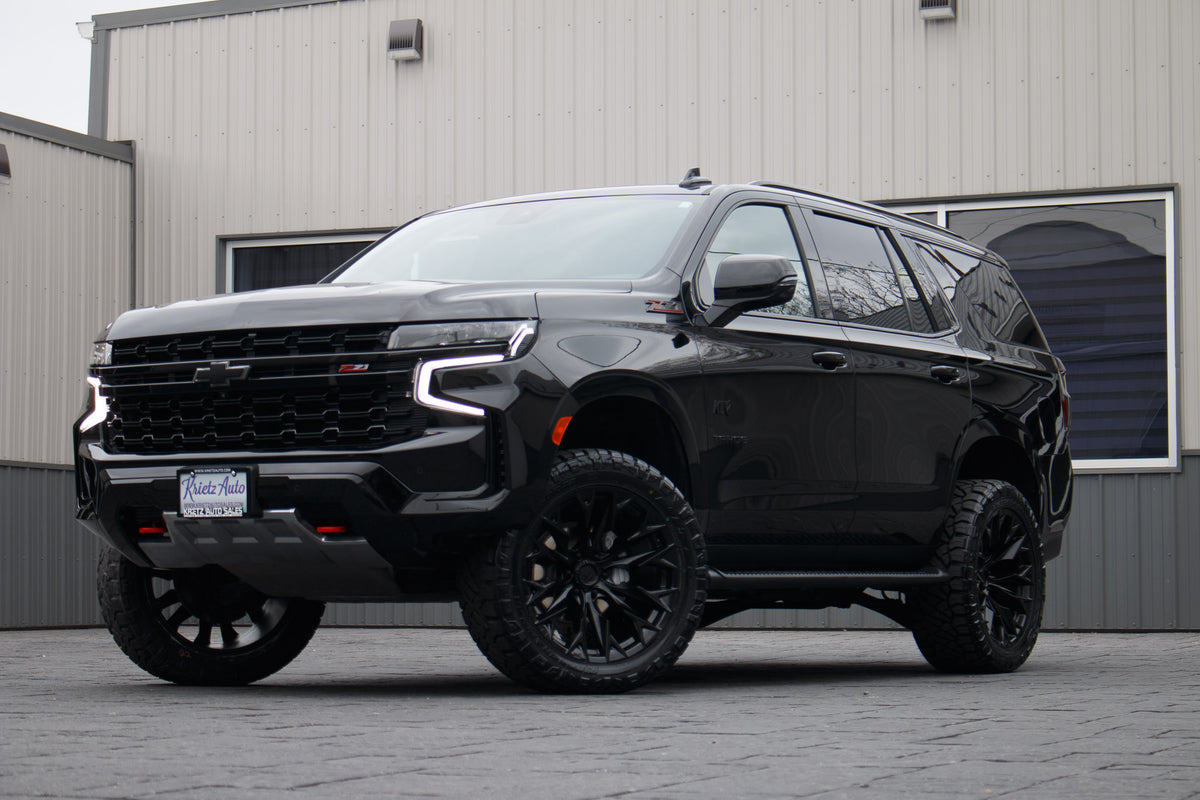 2023 Chevrolet Tahoe Z71 with a 3" ReadyLift lift kit, 22x10 Fuel Flame wheels, and 295/50 Nitto Ridge Grappler tires.