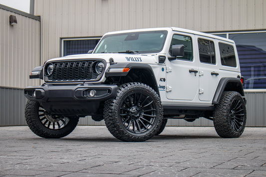 2025 Jeep Wrangler Willys 4XE with a 2.5" Rough Country lift kit, 22x10 Fuel Blade wheels, and 35" Fury Country Hunter R/T tires.