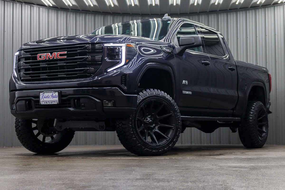 2024 GMC Sierra 1500 Elevation with a 6" Rough Country lift kit, 22x12 Fuel Super C wheels, and 35" Fury Country Hunter R/T tires.