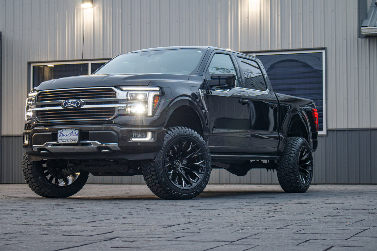 2024 Ford F-150 King Ranch with a 6" ReadyLift lift kit, 22x12 Fuel Flame wheels, and 35" Fury Country Hunter R/T tires.