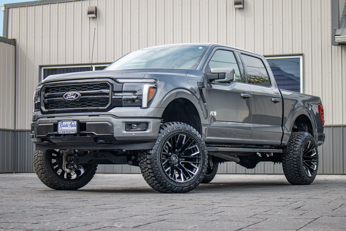 2025 Ford F-150 Lariat with a 6" Rough Country lift kit, 22x12 Fuel Rebar wheels, and 35" Fury Country Hunter R/T tires.