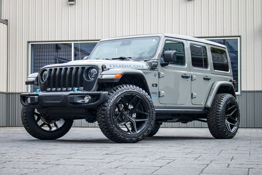 2023 Jeep Wrangler Unlimited Rubicon 4XE with Jeep Stock suspension, 22x12 Fuel Flux wheels, and 35" Fury Country Hunter R/T tires.