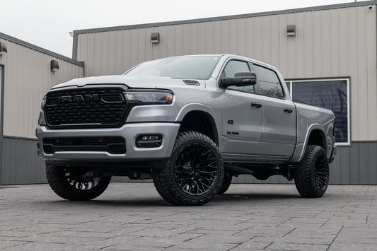 2025 Ram 1500 Lone Star with a 6" Rough Country lift kit, 22x12 Fuel Strike wheels, and 35" Fury Country Hunter R/T tires.