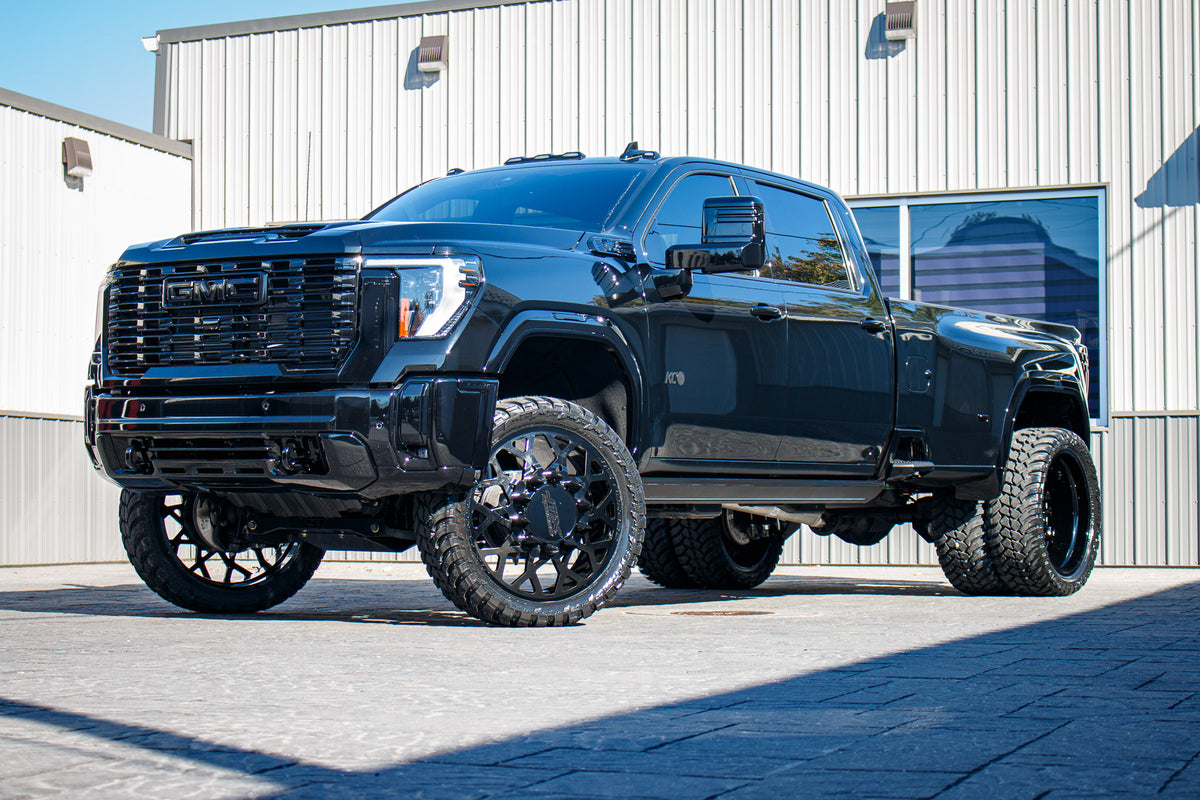 2024 GMC Sierra 3500 Denali Ultimate with a 4" CST lift kit, 26x8.25 JTX Alpha wheels, and 37" AMP Terrain Attack M/T A tires.