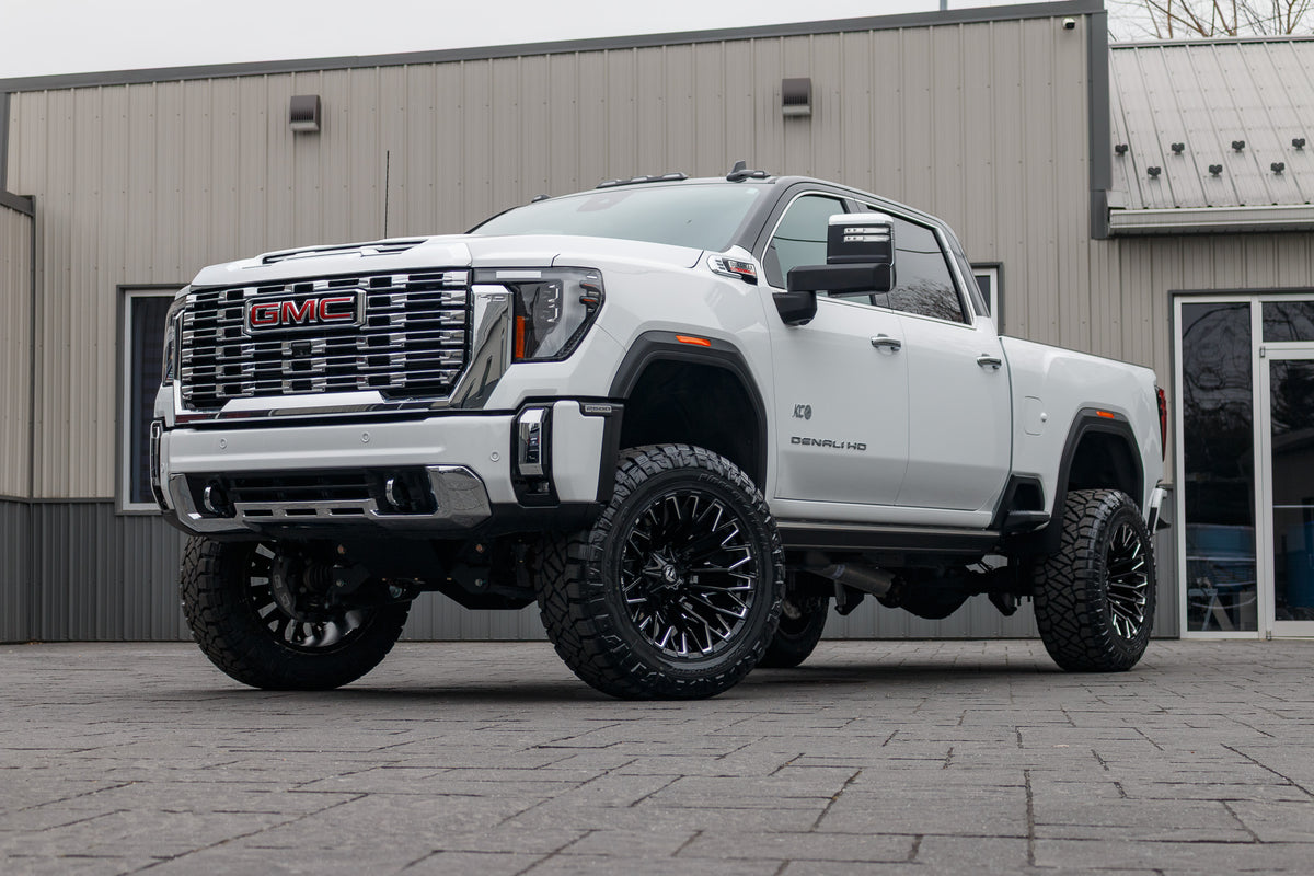 2024 GMC Sierra 2500 Denali with a 5" BDS lift kit, 22x12 Fuel Strike wheels, and 37" Nitto Ridge Grappler tires.