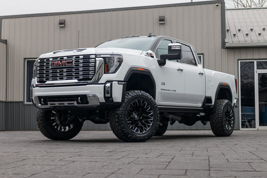 2024 GMC Sierra 2500 Denali with a 5" BDS lift kit, 22x12 Fuel Strike wheels, and 37" Nitto Ridge Grappler tires.