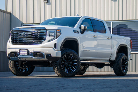 2024 GMC Sierra 1500 Denali Ultimate with a 6" Rough Country lift kit, 22x12 Fuel Rebar wheels, and 35" Fury Country Hunter R/T tires.