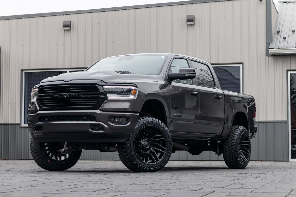 2024 Ram 1500 Laramie with a 6" Rough Country lift kit, 22x12 Fuel Typhoon wheels, and 35" Fury Country Hunter R/T tires.